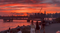 Striking Sunset Casts Orange Glow Over Manhattan Skyline