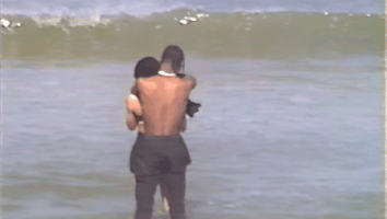 Travis Scott Hug Kylie Jenner GIF
