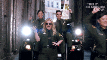 KellyClarksonShow yes music video wink police GIF