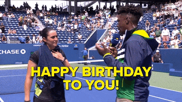 Sports gif. Reporter speaks into a microphone as Ons Jabeur starts to smile on the US Open court. She breaks into laughter, then smiles even wider. Text reads, "Happy birthday to you!'