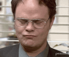 The Office gif. Rainn Wilson as Dwight Schrute speechless, closing his eyes, shaking his head, looking up, and taking a deep breath.