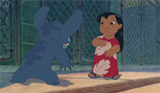 Movie gif. Stitch runs towards Lilo and grabs her in a tight embrace. 