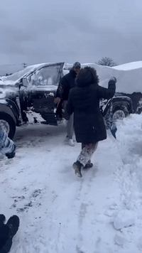 Bills Players Dig Cars Out of Deep Snow Upon Return to Buffalo