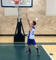 6'2" College Basketball Player Dunks From Behind Free Throw Line