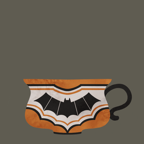 Digital illustration. Black cat pops its head out and in of the teacup it's sitting in while blinking it's round, yellow eyes open and closed on loop. The teacup has a black bat on the front of it. 