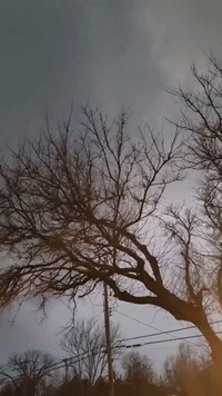 Lightning Flashes in Kansas Sky During Thunderstorm