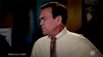 TV gif. Frustrated Joe Lo Truglio as Charles in Brooklyn Nine-Nine throws a hand down in anger as if to say, “Dang it!”