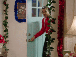 Ad gif. Steve Erkel-looking man opens the door, entering a home decorated for Christmas and walking in on a family of people in Christmas pajamas who look back at him. As he walks in he says, "Oopsie doopsies, did I do something I shouldn't have done?"