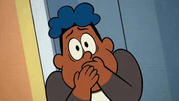 TV gif. We zoom in on the shocked face of Lemo from Big Blue, covering his mouth with both hands as his eyes shift back and forth in terror.