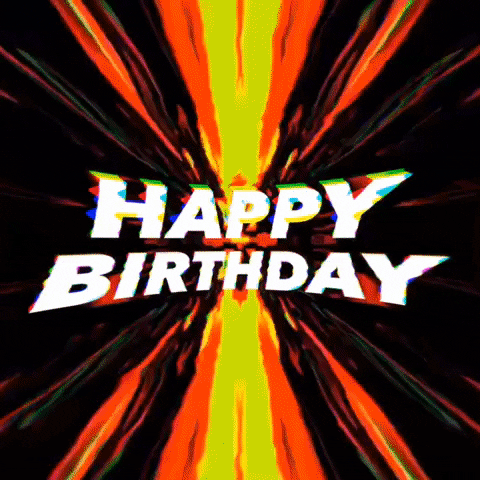 Text gif. Above a backdrop of exploding colors reads the message, “Happy birthday.”