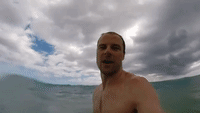 Unsuspecting Man Gets Hit by Big Wave in Hawaii