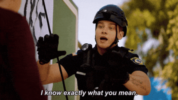 TV gif. Oliver Stark as Buck from 9-1-1 holds out his hands to calm down the person he is speaking to, saying, "I know exactly what you mean," which appears as text.