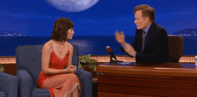Conspiring Lizzy Caplan GIF by Team Coco