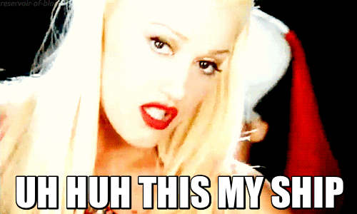 Gwen Stefani singing in the music video for "Hollaback Girl"