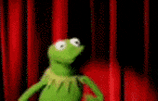 Muppets gif. Kermit the Frog flails around erratically, shaking his head with a wide open mouth and his long frog arms slop around.