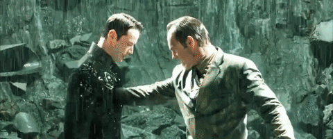 Agent Smith Neo Hand In Chest GIF