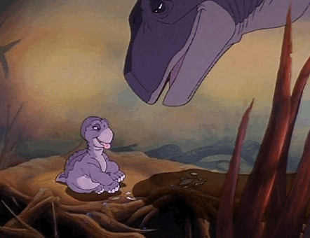 Animovaný gif s dinosauří matkou líbající dinosauří mládě. 