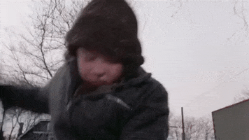 Movie gif. Peter Billingsley as Ralphie in A Christmas Story yells while punching down wildly and furiously.