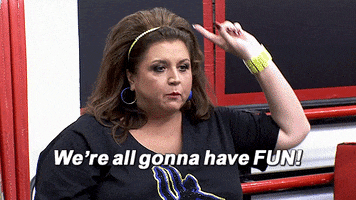 Reality TV gif. Abby Lee Miller from Dance Moms looking serious and yelling, "we're all gonna have fun!"