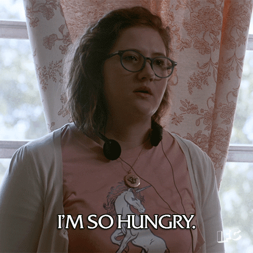 TV gif. Deborah Baker Jr. as Denise in Stan Against Evil looks sadly into the distance, swaying slightly as she says, "I'm so hungry."