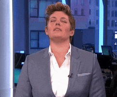 Political gif. Sally Kohn, a commentator, stifles a laugh as she sighs and looks up towards the ceiling.