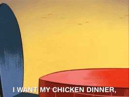 Cartoon gif. An intense-looking Ren from the Ren and Stimpy Show zips into a seat at a dining table, clutching a fork and knife. He shakes the utensils, then slams them against the tabletop. Text, "I want my chicken dinner, and I want it now!"
