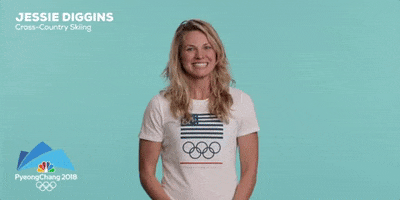 Sports gif. Jessie Diggins opens her mouth wide open and smiles as she pumps her arms in excitement. Text, “Jessie Diggins, Cross-country skiing. Pyeongchang twenty eighteen.”