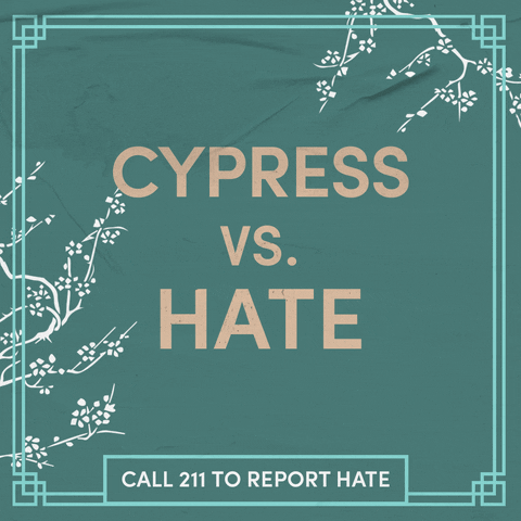 Text gif. Ecru letters on a sage green background, surrounded by swaying cherry blossom branches as a butterfly glides through. Text, "Cypress vs hate, call 211 to report hate."