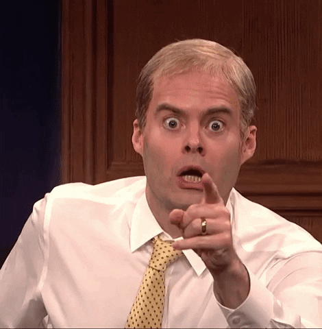 SNL gif. Bill Hader impersonating Jim Jordan wearing a shirt and tie points at us as if to say, "It's you!" with an astonished look on his face.