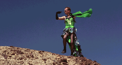 Gif of Hugo Weaving from Priscilla Queen of the Desert dancing in the desert