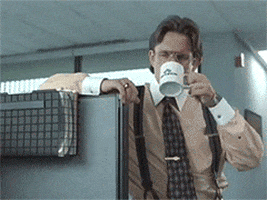 Movie gif. Gary Cole as Bill Lumbergh from the movie Office Space peers through his large eyeglasses and leans on a cubicle wall. He looks down intimidatingly and slowly lifts his coffee mug up to take a small swig. 