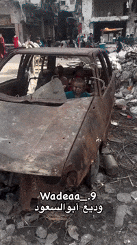 Gaza Children Play in Destroyed Car