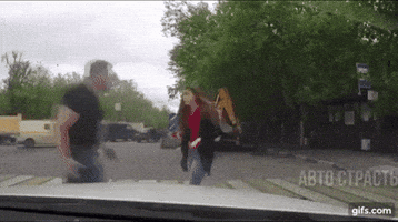 Girl Kicks Man In Head GIF