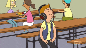 Cartoon gif. Jimmi Jr from Bob's Burger is listening to headphones in the middle of the cafeteria. His eyes are closed as he's in rapture to the music and he dances sexily, touching his body and doing the wave, uncaring that he's in a public space.