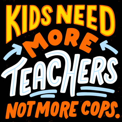Digital art gif. Yellow, orange and white bold, all-caps text reads, "Kids need more teachers, not more cops," with two little arrows pointing to the word "more" against a black background.