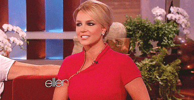 Celebrity gif. Britney Spears is on the Ellen Show. She reactions to something that makes her face scrunch up cringing, her chin tucking inwards and her lips frown on loop.