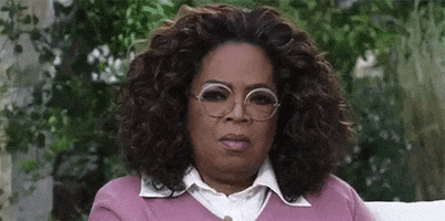 Celebrity gif. Oprah Winfrey shakes her head in disappointment and disbelief.