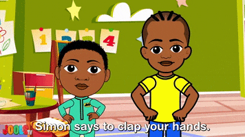 Cartoon gif. From JoolsTV, two children standing in a classroom clap their hands. Text, “Simon says to clap your hands.”