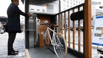 biking or maybe like how wizards get into the ministry of magic GIF by Digg