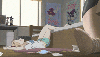 Anime gif. Lying on the ground with her feet propped up on the bed, Kyoko in Yuruyuri flops over onto her belly, looking bored.