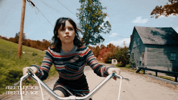Jenna Ortega Bike GIF by Warner Bros. Pictures