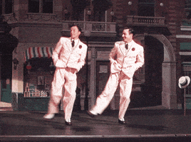 gene kelly happy dance GIF