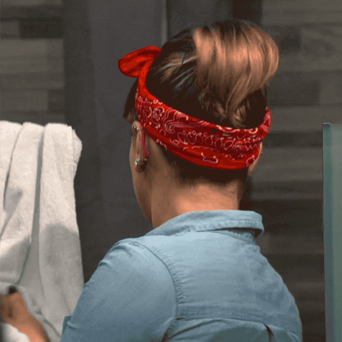 Video gif. Woman dressed up like Rosie the Riveter whips around while drying her hands. Her eyes are widened in complete shock, as if we just said something unbelievable.