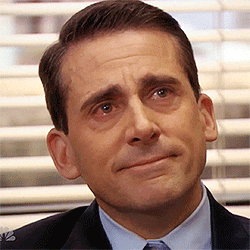 The Office gif. Steve Carrell as Michael Scott is teary-eyed, looking up as he gives a subtle smile.