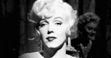 Marilyn Monroe Shrug GIF