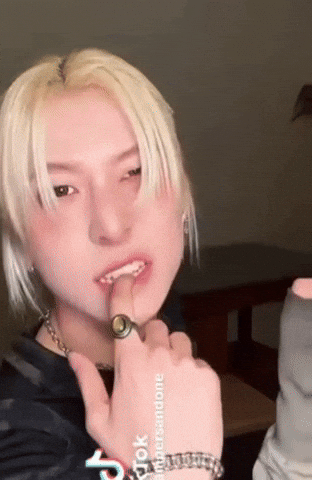 Sexy Finger Bite GIF