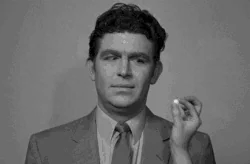 a face in the crowd pill GIF