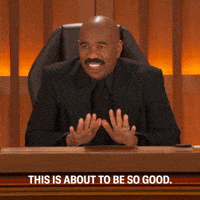 TV gif. Comedian Steve Harvey sits on the bench of the Judge Steve Harvey courtroom show. He grins and gesticulates as he tells his audience the show is about to be So good. Text, This is about to be so good.