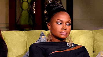 Reality TV gif. Phaedra Parks on Real Housewives of Atlanta rolls her eyes back as far as they will go.