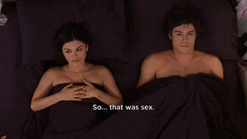 TV gif. Rachel Bilson as Summer on The OC, glances to the side with her hands over her chest, lying in bed under sheets with Adam Brody as Seth, who stares up and says, "so... that was sex," which appears as text.